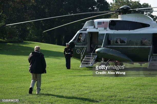 President Donald Trump walks towards the Marine One prior to a departure at the South Lawn of the White House September 19, 2018 in Washington, DC....