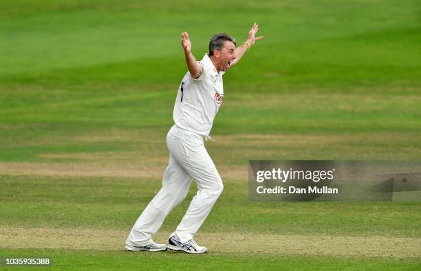 Rikki Clarke of Surrey appeals for the wicket of Tom Banton of Somerset during day two of the Specsavers County Championship Division One match...