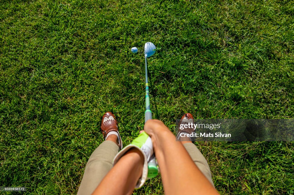 Golfer with Golf Club Fairway Wood and Golf Ball