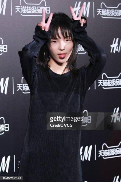 Model Xiao Wen Ju attends H&M Studio event on September 12, 2018 in Shanghai, China.