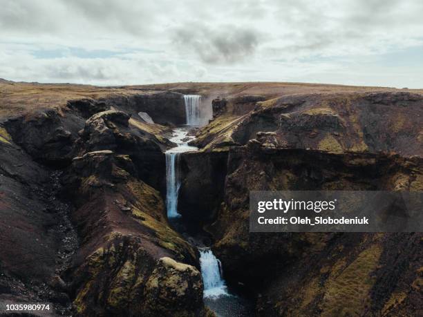 scenic aerial view of waterfall in iceland - westfjords iceland stock pictures, royalty-free photos & images