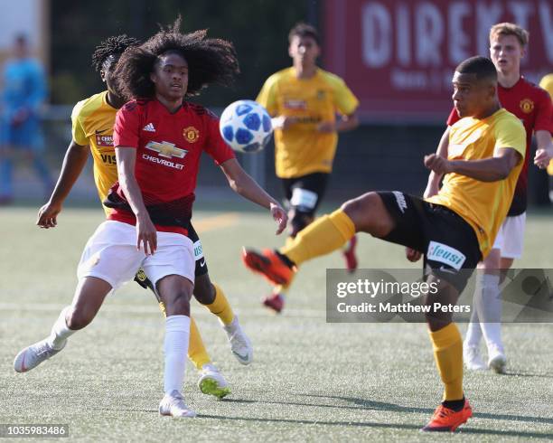 Tahith Chong of Manchester United U19s in action with Kabeya Muteba of BSC Young Boys U19s during the UEFA Youth League match between BSC Young Boys...