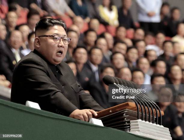 North Korean leader Kim Jong Un speaks after watch the gymnastic and artistic performance at the May Day Stadium on September 19, 2018 in Pyongyang,...