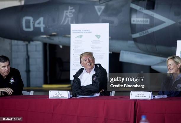 President Donald Trump speaks as Roy Cooper, governor of North Carolina, left, listens and Kirstjen Nielsen, U.S. Secretary of Homeland Security ,...