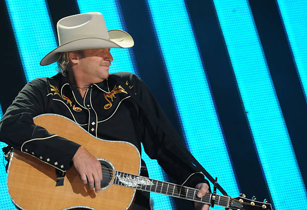 Alan Jackson performs at the VAULT Concert Stage during the 2008 CMA Music Festival on June 7, 2008 at LP Field in Nashville, Tennessee.