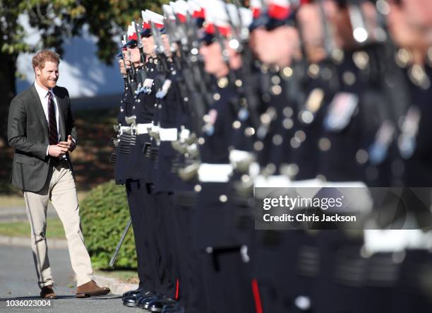 Prince Harry, Duke of Sussex visits The Royal Marines Commando Training Centre on September 13, 2018 in Lympstone, United Kingdom. The Duke arrived...