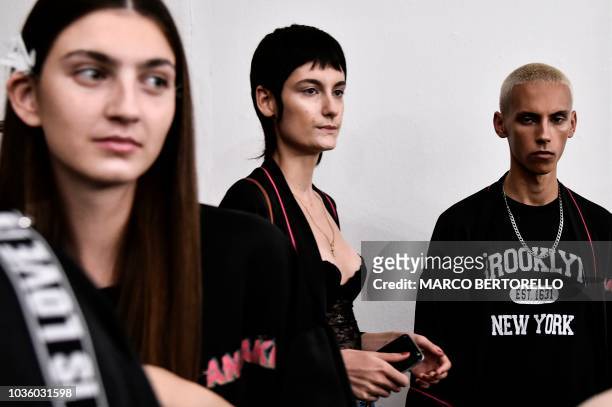 Models and dressers wait backstage before presenting creations by Annakiki during the Women's Spring/Summer 2019 fashion shows in Milan, on September...