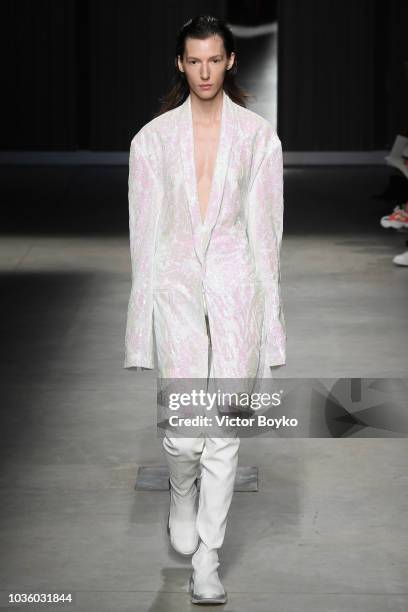 Model walks the runway at the Ricostru show during Milan Fashion Week Spring/Summer 2019 on September 19, 2018 in Milan, Italy.