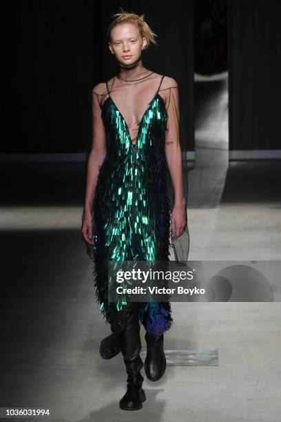 Model walks the runway at the Ricostru show during Milan Fashion Week Spring/Summer 2019 on September 19, 2018 in Milan, Italy.