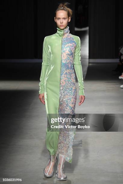 Model walks the runway at the Ricostru show during Milan Fashion Week Spring/Summer 2019 on September 19, 2018 in Milan, Italy.