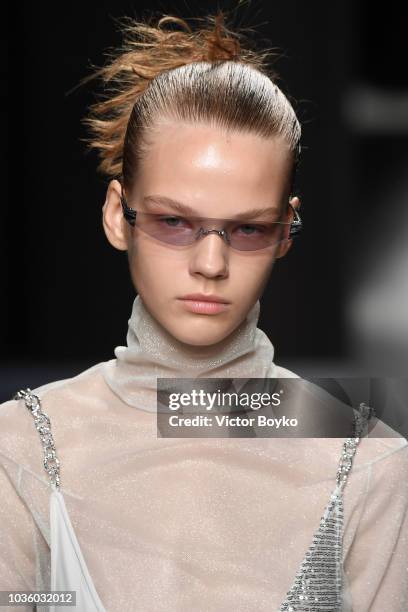 Model walks the runway at the Ricostru show during Milan Fashion Week Spring/Summer 2019 on September 19, 2018 in Milan, Italy.