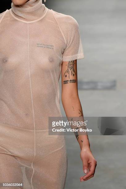 Model, fashion detail, walks the runway at the Ricostru show during Milan Fashion Week Spring/Summer 2019 on September 19, 2018 in Milan, Italy.