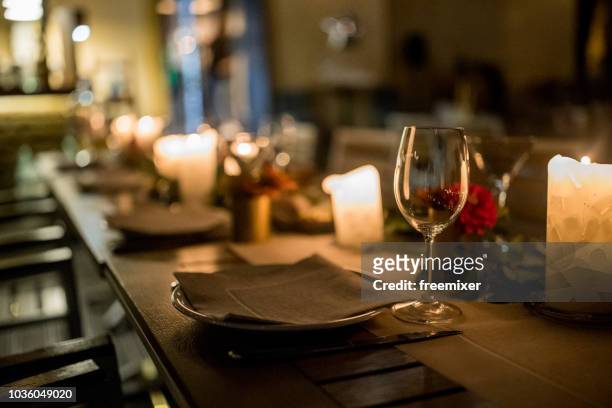 beautifully decorated dinning table - luxury table setting stock pictures, royalty-free photos & images