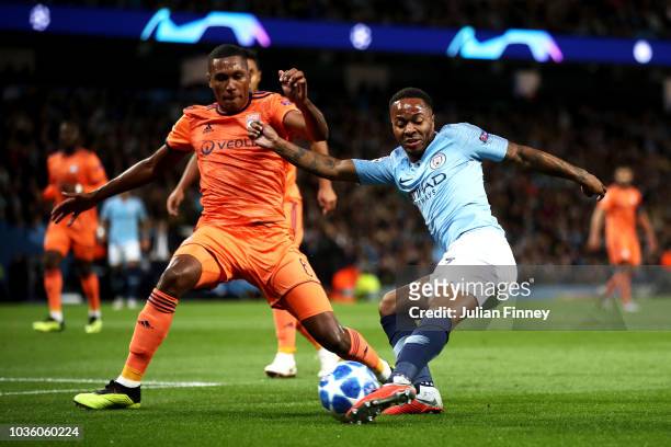 Raheem Sterling of Manchester City shoots while under pressure from Marcelo of Lyon during the Group F match of the UEFA Champions League between...