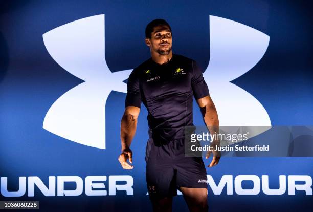 Anthony Joshua enters the arena for Anthony Joshua And Alexander Povetkin Media Workout on September 19, 2018 in London, England.