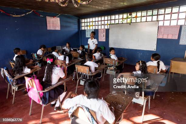 Department of Amazonas. Start of the new school year in Puerto Narino. Lesson in a classroom for schoolboys and schoolgirls in uniform.