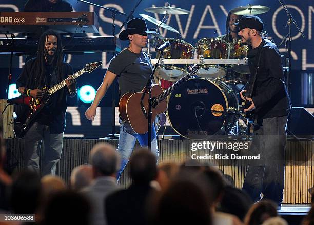 Musician Kenny Chesney performs "Everybody Wants to Go to Heaven" and "Three Little Birds" with the Wailers on stage during the 42nd Annual CMA...