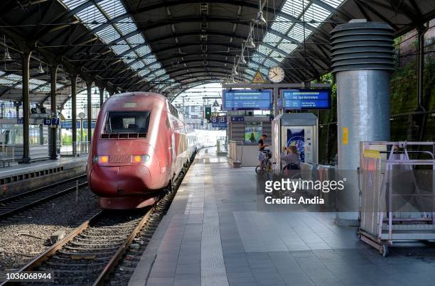 Aachen. Thalys train along the platform in the central railway station.