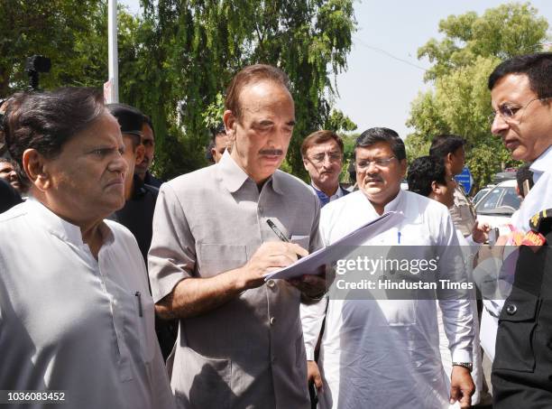 Congress leaders Ghulam Nabi Azad, Ahmed Patel, Randeep Singh Surjewala, Mukul Wasnik and others after meeting with the Comptroller and Auditor...