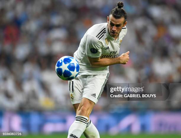 Real Madrid's Welsh forward Gareth Bale misses a goal opportunity during the UEFA Champions League group G football match between Real Madrid CF and...