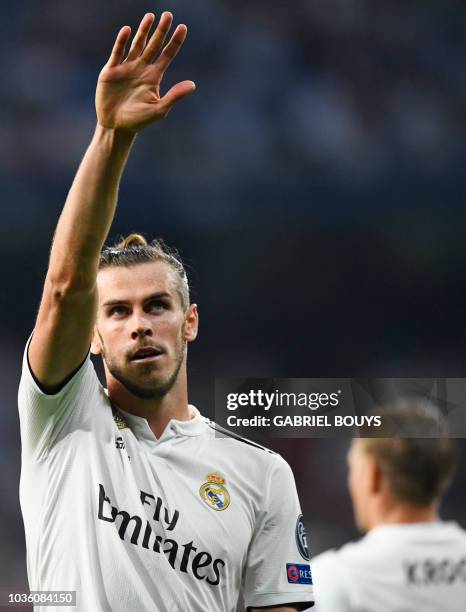 Real Madrid's Welsh forward Gareth Bale celebrates scoring his team's second goal during the UEFA Champions League group G football match between...