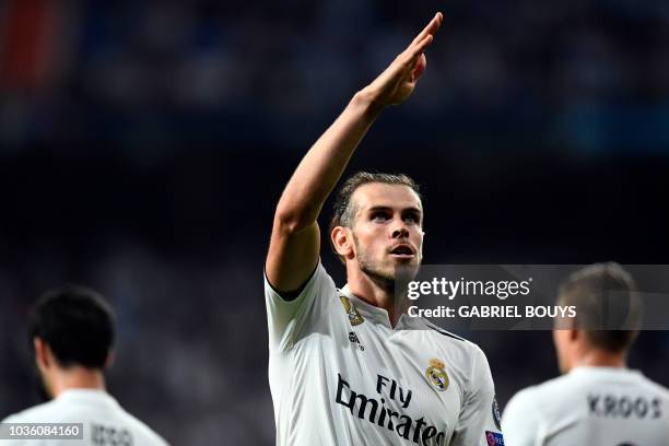 Real Madrid's Welsh forward Gareth Bale celebrates scoring his team's second goal during the UEFA Champions League group G football match between...