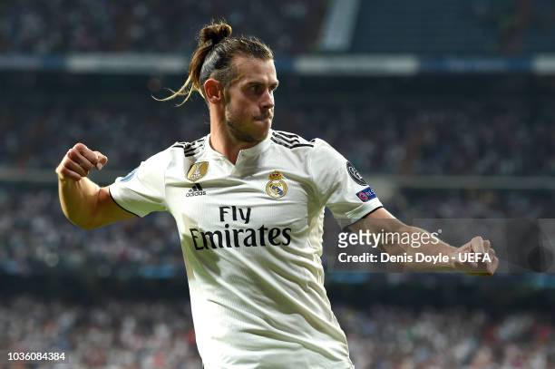 Gareth Bale of Real Madrid celebrates after scoring his team's second goal during the Group G match of the UEFA Champions League between Real Madrid...