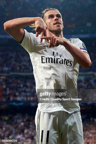 Gareth Bale of Real Madrid celebrates after scoring his team's second goal during the Group G match of the UEFA Champions League between Real Madrid...