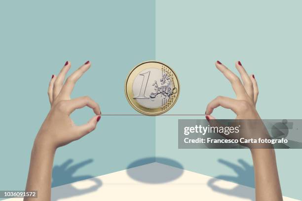 financial risk - euro in hand stock pictures, royalty-free photos & images