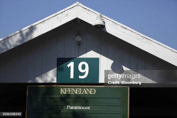 Signage is displayed above a stable during the 75th annual Keeneland September Yearling Sale at Keeneland Racecourse in Lexington, Kentucky, U.S., on...