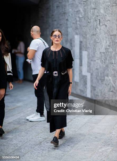 Olivia Palermo wearing black dress, Jimmy Choo sunglasses seen outside Alberta Ferretti during Milan Fashion Week Spring/Summer 2019 on September 19,...