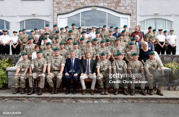 Prince Harry, Duke of Sussex poses for a group photo at The Royal Marines Commnado Training Centre on September 13, 2018 in Lympstone, United...