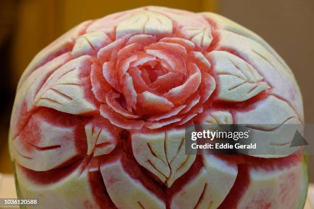 close up of carved watermelon - thai fruit carving stock pictures, royalty-free photos & images