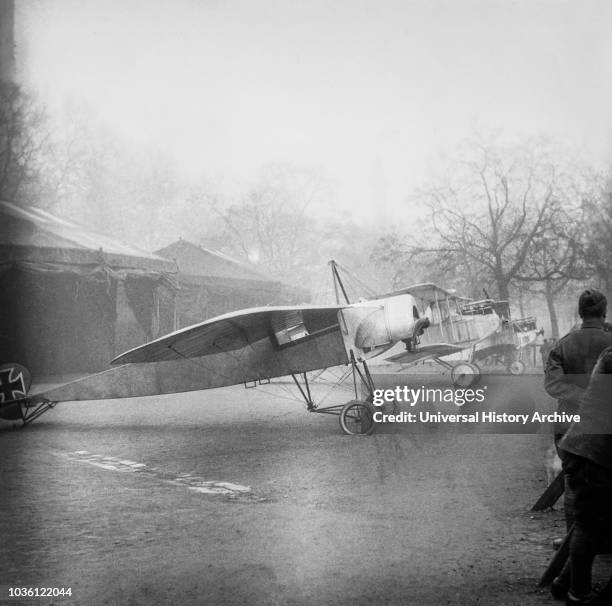 Magic lantern slide WW1, 1914-1918, World war one images. German Fokker aircaraft, single wing and bi plane. Display of captured German weapons and...