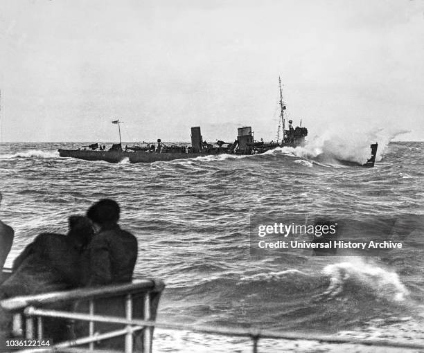 Magic lantern slide WW1, 1914-1918, World war one images. Royal Navy torpedo boat escorting a channel steam merchant ship.