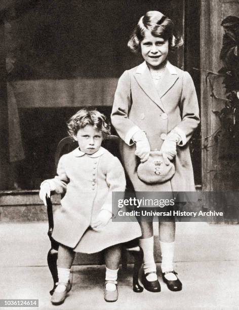 Princess Elizabeth of York and her younger sister Princess Margaret with gifts presented to them by members of the Disabled Soldier's Embroidery...