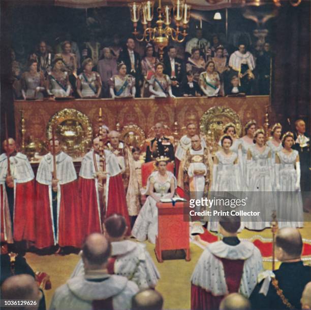 The Queen, after her entry into the Abbey Church of Westminster, is seated in her Chair of Estate', 1953. Elizabeth II , Queen of the United Kingdom...