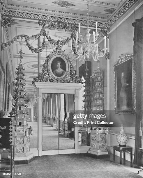The Principal Corridor, Buckingham Palace, South End', 1939. Mirrored wall in the royal family's London residence, with two ornamental Chinese...