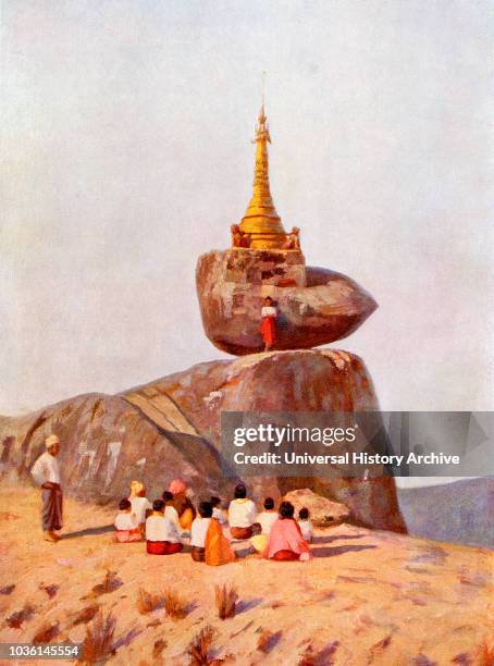 The Kyaiktiyo Pagoda, Mon State, Burma. A small pagoda built on the top of a granite boulder. From The Wonders of the World, published c.1920.