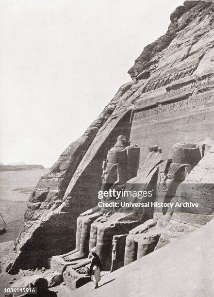 The Abu Simbel Temples, Nubia, Egypt, seen here c. 1920 before their relocation in 1968 to an artificial hill made from a domed structure, high above...