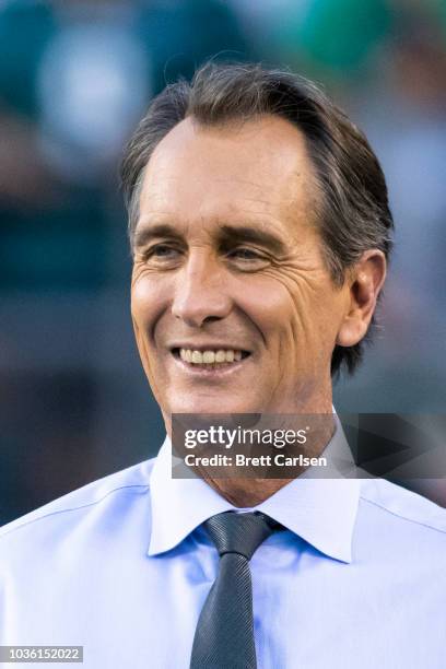 Sports commentator Cris Collinsworth walks on the field before the game between the Philadelphia Eagles and the Atlanta Falcons at Lincoln Financial...