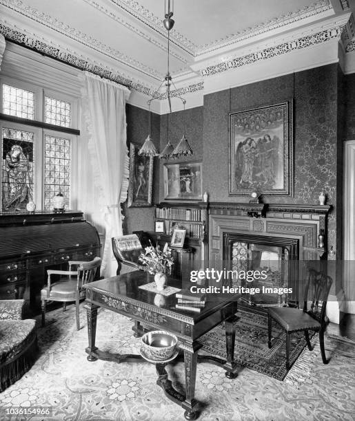 Library, Holmestead, North Mossley Hill Road, Liverpool, Merseyside, 1901. View of the Arts and Crafts interior with Pre-Raphaelite items. The...