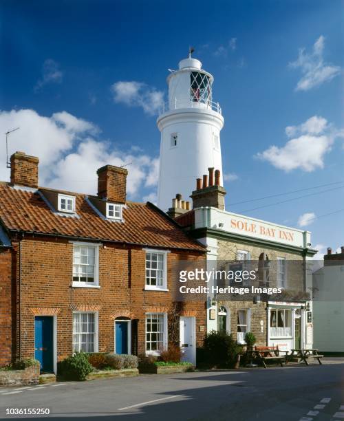 Lighthouse and Sole Bay Inn, Southwold, Suffolk, 2010. Artist John Critchley.