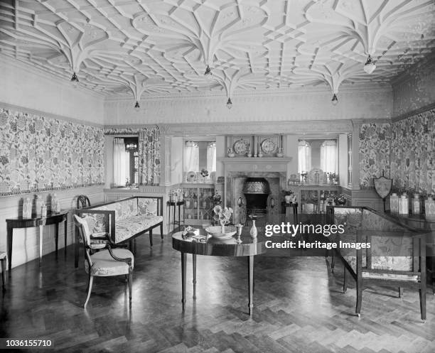 Victorian drawing room, Bidston Court, Birkenhead, Merseyside, 1894. View of the drawing room looking towards the windows and fireplace. Bidston...