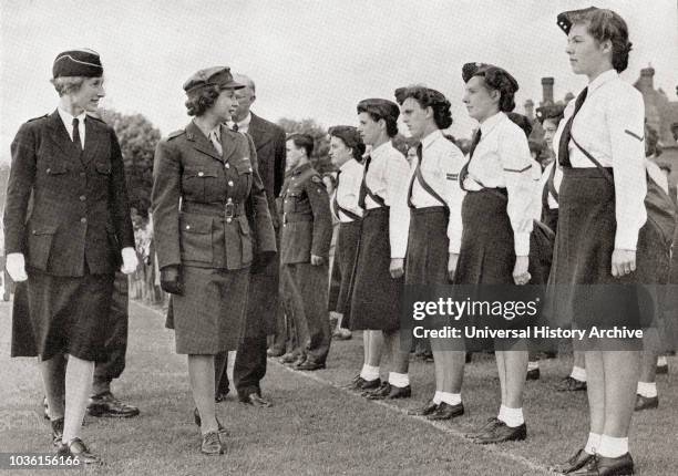 Princess Elizabeth inspecting the Girls' Training Corps, 1945. Princess Elizabeth of York, future Elizabeth II, born 1926. Queen of the United...