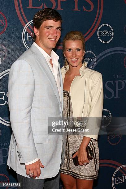 Quarterback Eli Manning and his wife Abby McGrew arrive at the 2008 ESPYs Giant Event Hosted by Eli Manning held at J Bar and Lounge on July 15, 2008...
