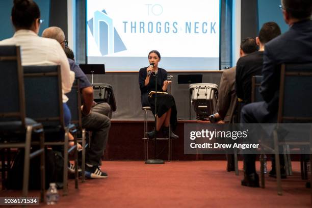 Alexandria Ocasio-Cortez, Democratic candidate running for New York's 14th Congressional district, answers questions at a town hall event, September...