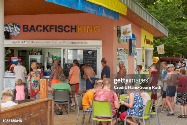 fish snack "backfischking" in koserow - baltic sea fish stock pictures, royalty-free photos & images