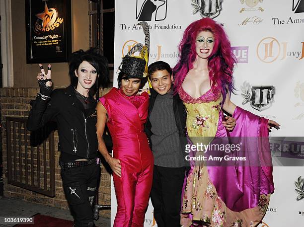 Television personality Klynt, fashion designer Merlin, Jovy Janolo and television personality Vyxsin attend "A Christmas Story" Fashion Benefit for...