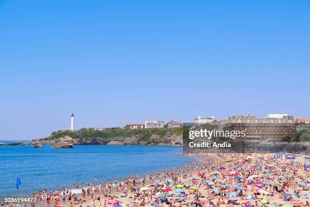 Biarritz : the crowded 'Grande Plage' beach. Crowd on the main beach of Biarritz, people enjoying the sun, end of May